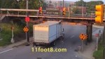 Red-light runner crashes truck into the 11foot8 bridge.mp4