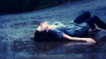 young-girl-lying-in-the-rain-HD.jpg