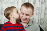 44655103-boy-giving-man-a-kiss-on-the-cheek.jpg