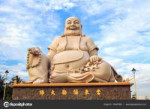 depositphotos135437508-stock-photo-sitting-smiling-buddha.jpg