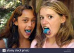 two-teenage-girls-show-off-their-blue-tongues-after-eating-[...].jpg