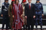 178055-moammar-gadhafi-and-female-body-guards.jpg