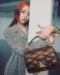 240228-le-sserafim-super-elle-x-louis-vuitton-march-2024-v0-sk7ytfaya8lc1.webp