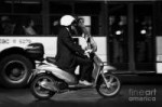 business-man-in-suit-and-white-helmet-on-scooter-commutes-p[...].jpg