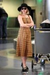 emma-roberts-at-los-angeles-international-airport-12-14-201[...].jpg