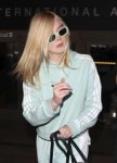 elle-fanning-at-los-angeles-international-airport-02-21-201[...].jpg