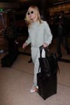 elle-fanning-at-los-angeles-international-airport-02-21-201[...].jpg