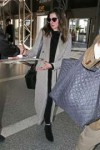 anne-hathaway-flight-out-of-los-angeles-at-lax-02-25-2018-1.jpg