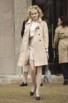 Julia-Garner--Arrives-at-Miu-Miu-Fashion-Show-2016--05.jpg