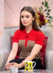 lily-collins-appeared-on-lorraine-tv-show-in-london-12-20-2[...].jpg