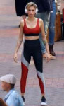 cara-delevingne-sports-multi-colored-activewear-while-filmi[...].jpg