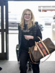 elle-fanning-travel-style-lax-airport-in-los-angeles-04-03-[...].jpg