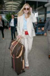 elle-fanning-arriving-at-nice-airport-05-12-2019-8.jpg