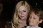 elle-fanning-arriving-at-chanel-party-in-cannes-05-22-2019-3.jpg