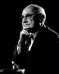 1200px-PortraitofMiltonFriedman.jpg