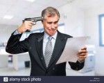 stock-photo-businessman-with-gun-wants-to-commit-suicide-52[...].jpg