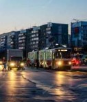 depositphotos129139252-stock-photo-tram-car-dusk-city-people.jpg