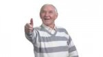 videoblocks-old-man-with-two-thumbs-up-happy-senior-man-giv[...].png