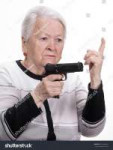 stock-photo-old-woman-with-pistol-on-a-white-background-181[...].jpg