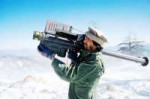 A Mujahideen fighter aims an FIM-92 Stinger missile at pass[...].jpg