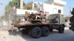 Israeli-backed FSA group Ahrar Nawa parade in southern Syri[...].png