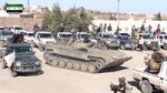 Israeli-backed FSA group Ahrar Nawa parade in southern Syri[...].png