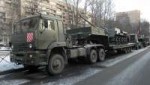 KamAZ-65225-perevozit-tank.jpg