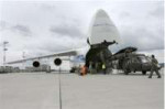 U.S. Soldiers help load a UH-60A Black Hawk helicopter into[...].jpg