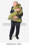 businessman-clutching-bag-of-money-ef0kjj.jpg