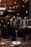 red-wine-is-pouring-into-glass-date275899-9.jpg